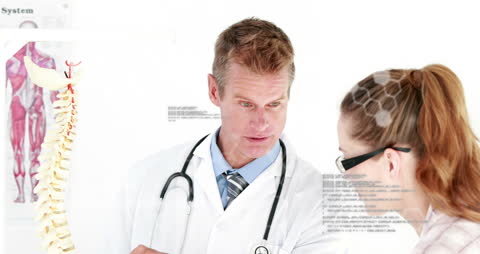 Medical Professionals Analyzing Medical Data in Modern Facility