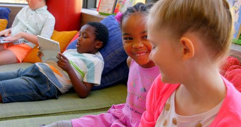 Diverse Group of School Children in Library Setting