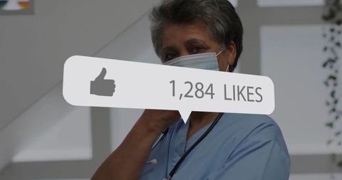 Healthcare Professional in Scrubs Receiving Social Media Likes