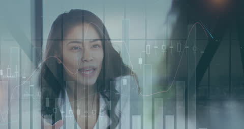 Businesswoman Analyzing Financial Data Graphics