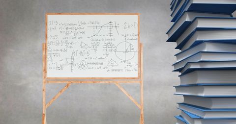 Mathematical Formulas on Whiteboard with Stack of Blue Books
