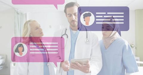 Medical Team Using Digital Tablet for Patient Care