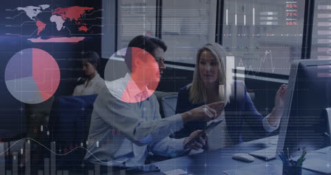 Business Analysts Discussing Financial Data Together in Office