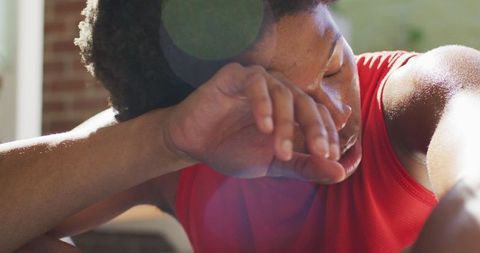 Exhausted African American Man Resting After Intense Home Workout
