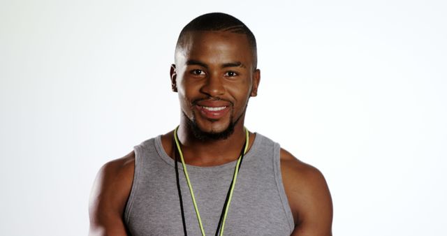 Confident African American Male Fitness Trainer Smiling in Sportswear - Download Free Stock Images Pikwizard.com