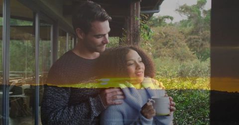 Couple on Veranda Sharing Quiet Moment in Rustic Countryside