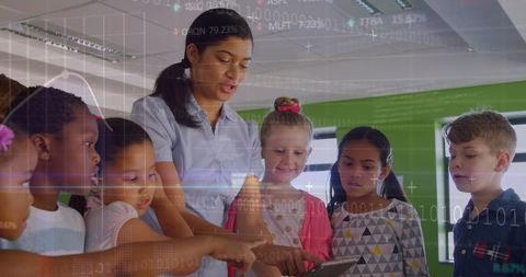 Teachers Guiding Young Students Through Financial Technology Concepts