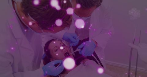 Dentist and Patient with Molecular Covid-19 Overlay