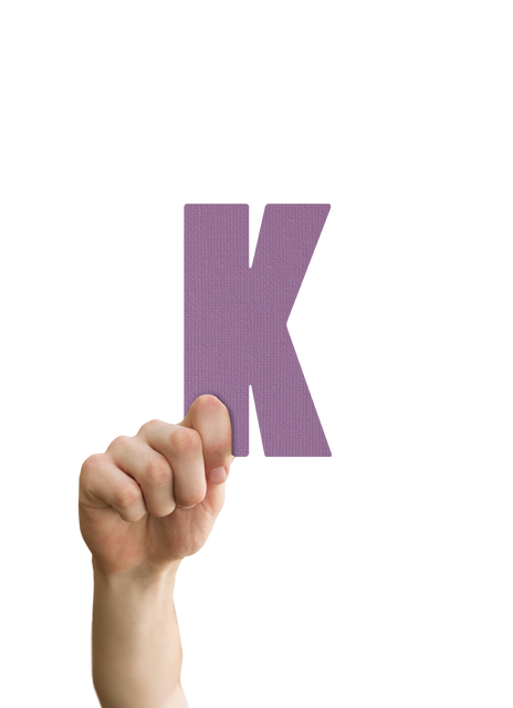 Hand Holding Purple Letter K on Transparent Background - Download Free Stock Videos Pikwizard.com