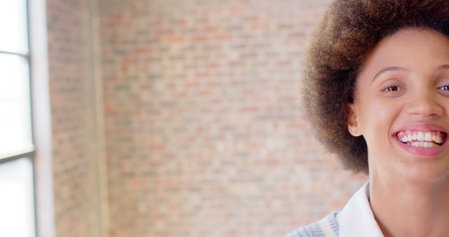 Smiling Woman with Curly Hair, Close-Up Half Faced - Download Free Stock Images Pikwizard.com