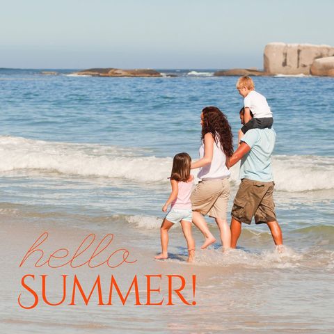 Family Enjoying Summer Beach Day Together