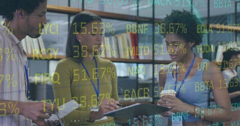 Diverse Office Team Analyzing Financial Data for Business Insights