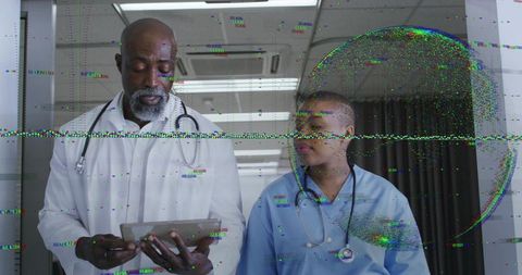 Clinicians walking corridor reviewing tablet with glitch overlay signaling digital disruption