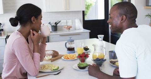 Happy Couple Enjoying Healthy Breakfast in Modern Kitchen - Download Free Stock Images Pikwizard.com
