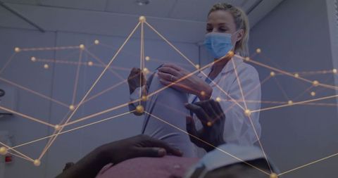 Healthcare professional conducting patient assessment with data overlay