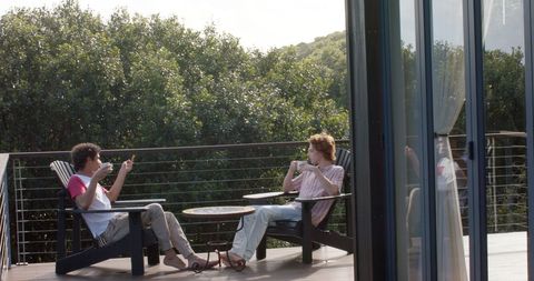 Happy Couple Enjoying Relaxing Coffee on Balcony - Download Free Stock Images Pikwizard.com