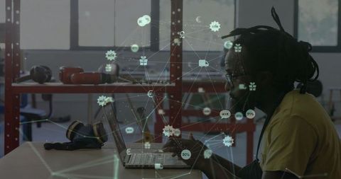 Diverse professional analyzing global business connections on laptop