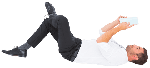 Businessman Lying on Back Using Tablet with Transparent Background - Download Free Stock Videos Pikwizard.com