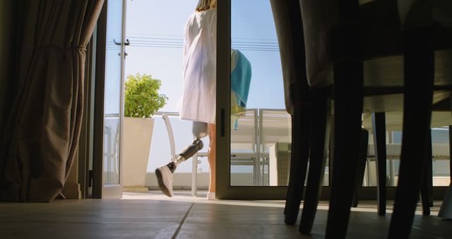 Woman with Prosthetic Legs Walking Outdoors on Sunny Day - Download Free Stock Images Pikwizard.com