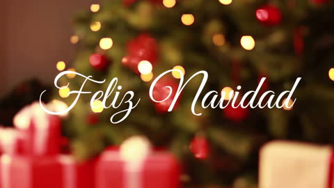 Feliz Navidad Text Against Festive Christmas Tree Lights and Gifts