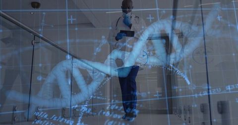 Male doctor analyzing dna data on tablet in futuristic hospital