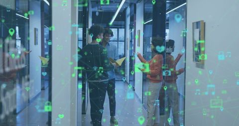 Tech overlay concept diverse team discussing in office corridor
