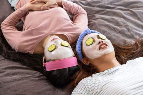 Mother and Daughter Enjoying Home Spa Facial Masks Together