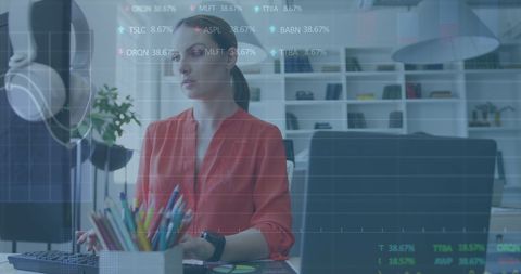 Businesswoman Analyzing Stock Data with Market Tickers Overlay - Download Free Stock Images Pikwizard.com