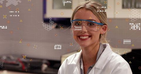 Smiling Female Scientist Wearing Goggles and Lab Coat Scanning Augmented Reality Data