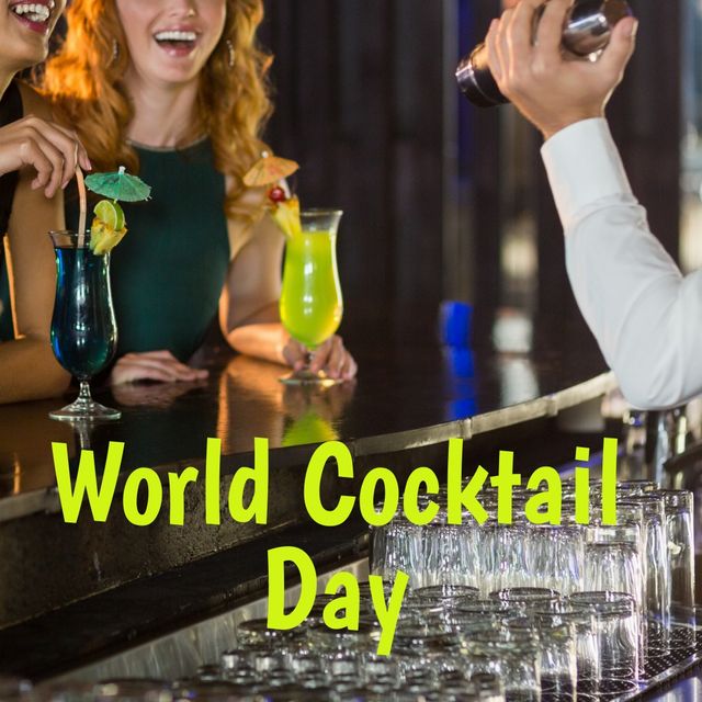 Male bartender mixing drinks at a lively bar with smiling friends enjoying colorful cocktails. The text 'World Cocktail Day' highlights the celebration. Ideal for promotions related to cocktail events, bar advertisements, social media campaigns for World Cocktail Day, and nightlife marketing.