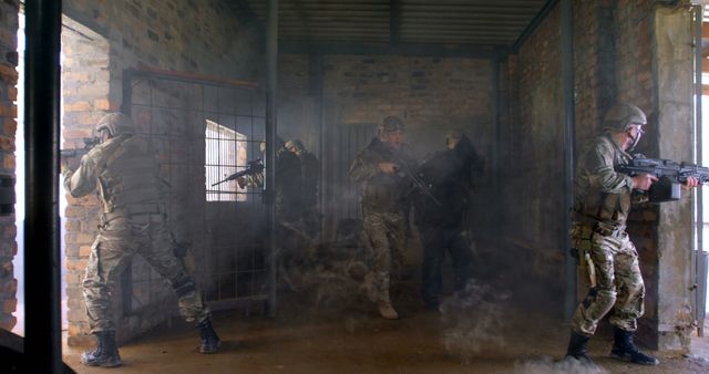 Special forces team in tactical gear training in an abandoned building with smoke present. Useful for illustrating military training, tactical operations, urban combat readiness, and teamwork in high-stress environments.