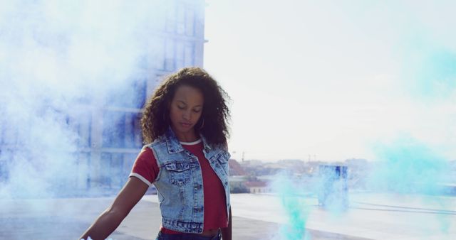 Confident Young Woman with Smoke Bomb on Urban Rooftop - Download Free Stock Images Pikwizard.com