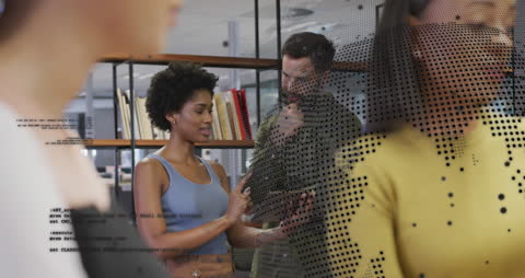 Collaborative Teamwork Amidst Digital Innovation in Modern Office