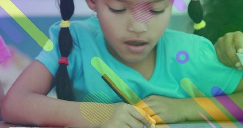 Creative Asian Girl Writing at Desk in Classroom with Decorative Overlay