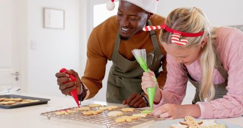 Festive Couple Decorating Holiday Gingerbread Cookies
