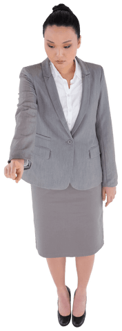 Asian businesswoman engaging with virtual interface on transparent background
