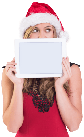 Festive Woman with Santa Hat Holding Tablet with Transparent Screen