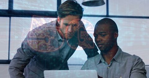 Diverse team analyzing 5g data technologies in modern office