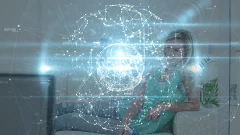 Connecting Dots Sphere Over Woman Relaxing at Home