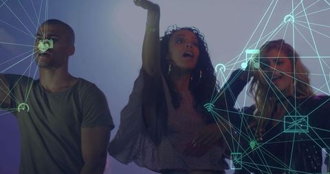 Trio singing and dancing under club lights with teal digital network overlay