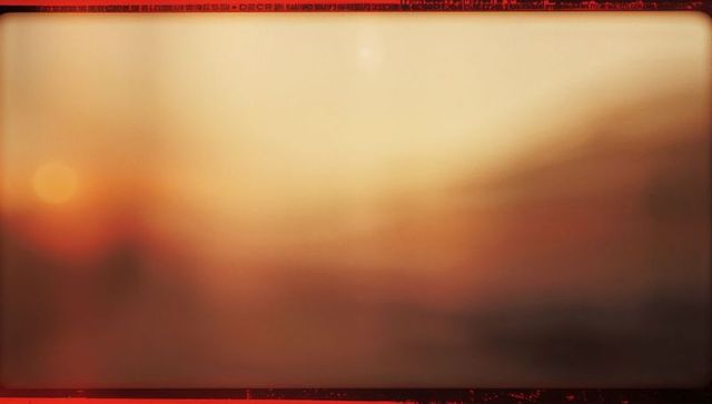 Ethereal Abstract Sunrise with Warm Orange and Beige Hues