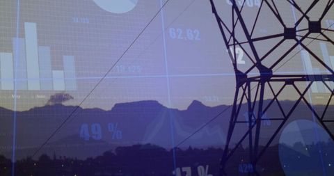 Silhouetting power pylon at dusk with data overlays for energy analytics, infrastructure