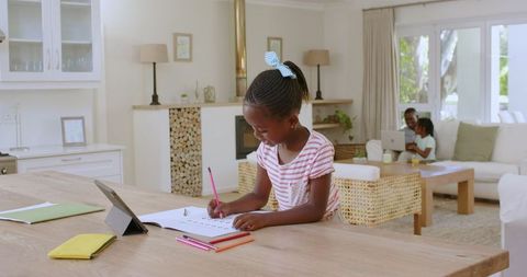 Happy Family Enjoying Artistic Time Together at Cozy Home