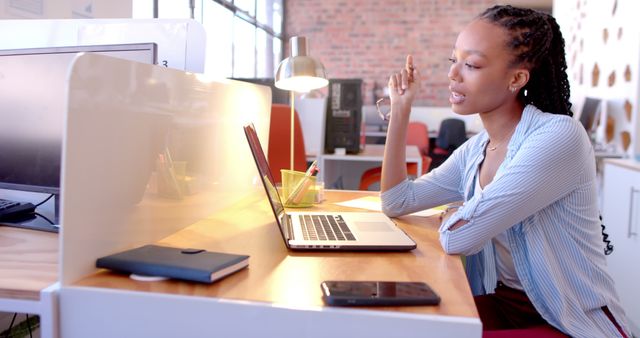 Young Professional Woman Having Video Call in Modern Office - Download Free Stock Images Pikwizard.com