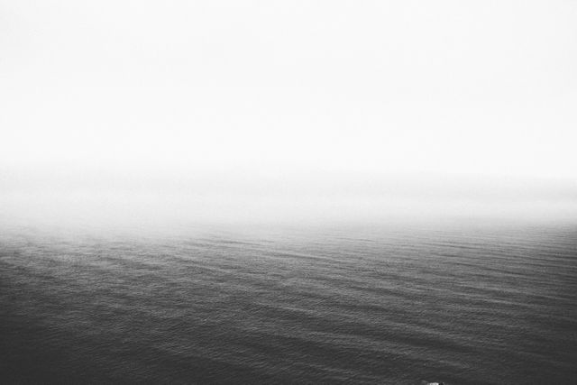 Serene Ocean Horizon Black and White Minimalist Photography - Download Free Stock Photos Pikwizard.com