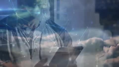 Mature Man Engaging with Digital Tablet and Cloud Network