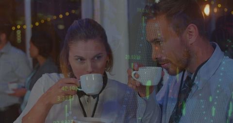 Business Professionals Using Technology Amid Stock Market Data