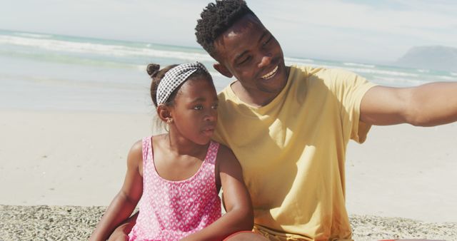 Father and Daughter Enjoying Day at Beach - Download Free Stock Images Pikwizard.com