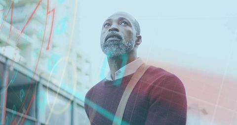 Businessman Analyzing Global Finance with Digital Overlay