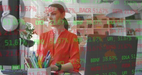 Businesswoman analyzing financial market on laptop in modern office